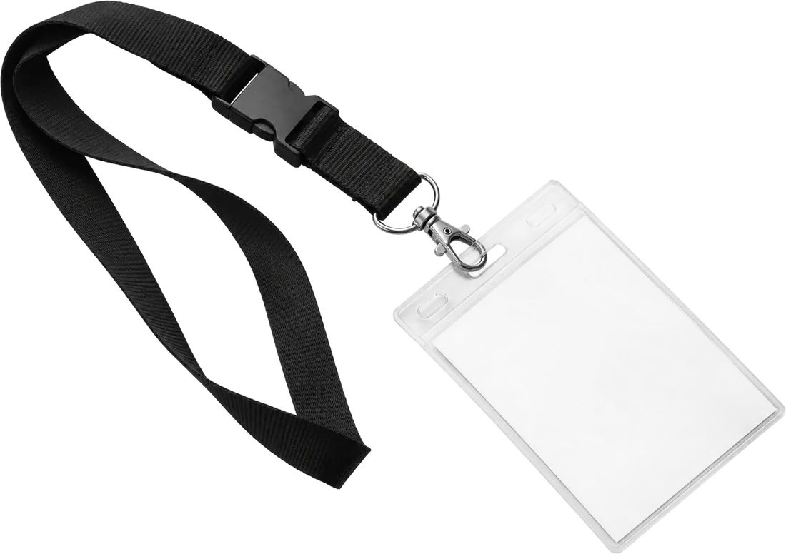 A lanyard with a blank ID badge, wearing down into the system’s marks and building back