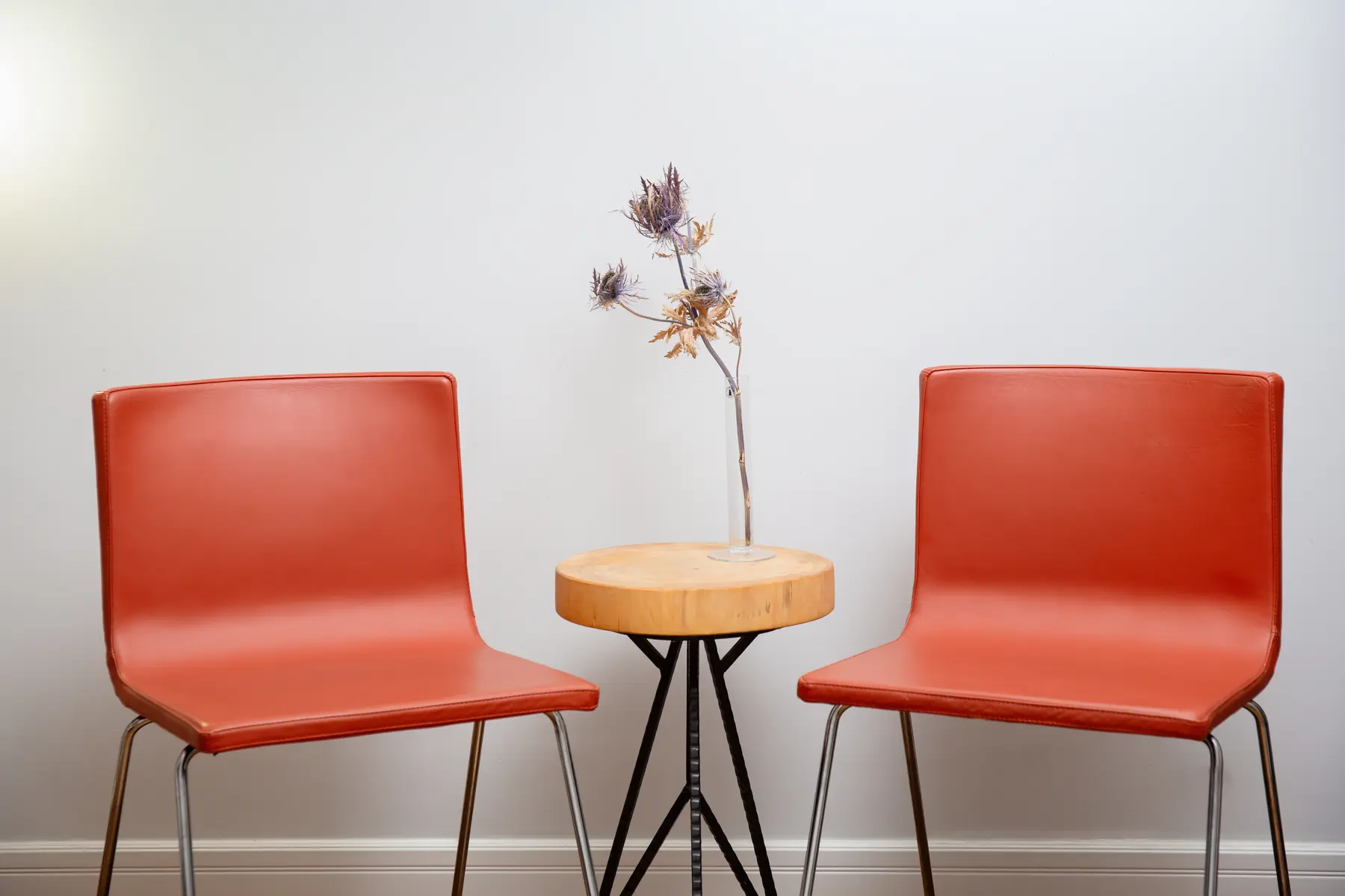 Two chairs facing each other across a small table